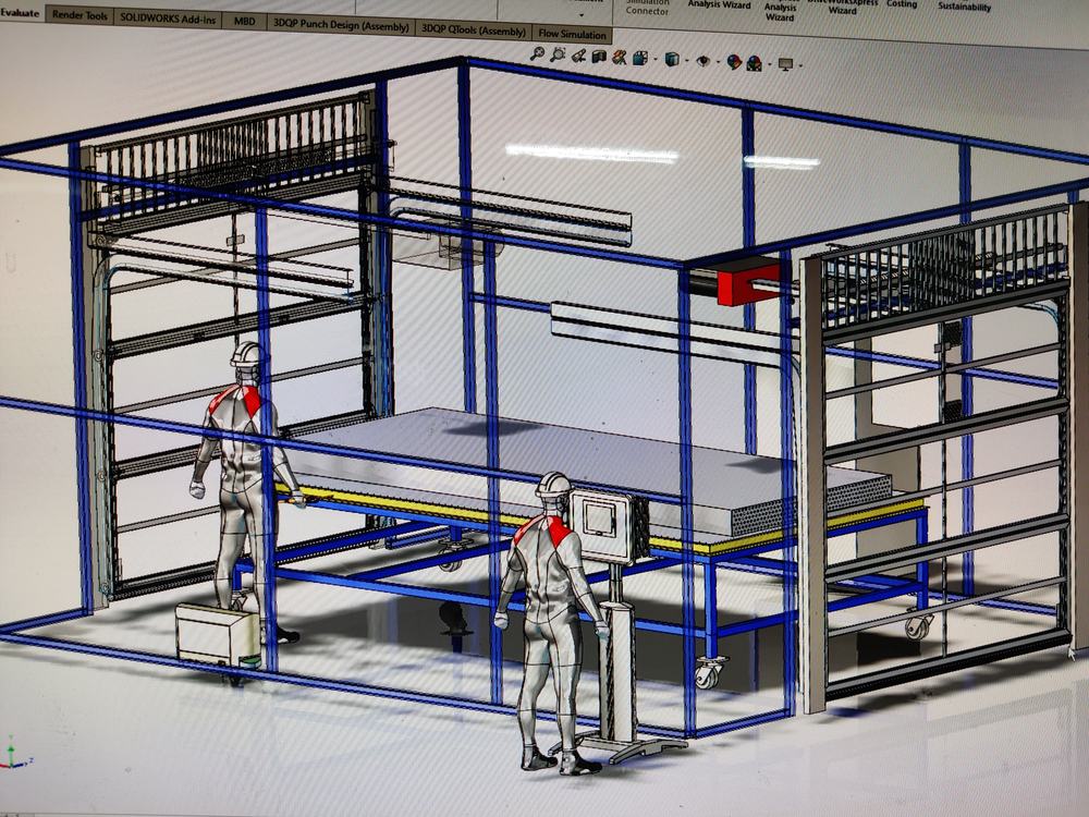 Modelo 3D de una estación de trabajo de varios niveles con figuras de operador para verificar alcance y ergonomía